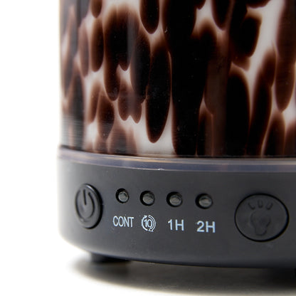 Brown torte electric wellness diffuser & essential oil blend