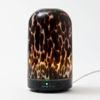 Brown torte electric wellness diffuser & essential oil blend