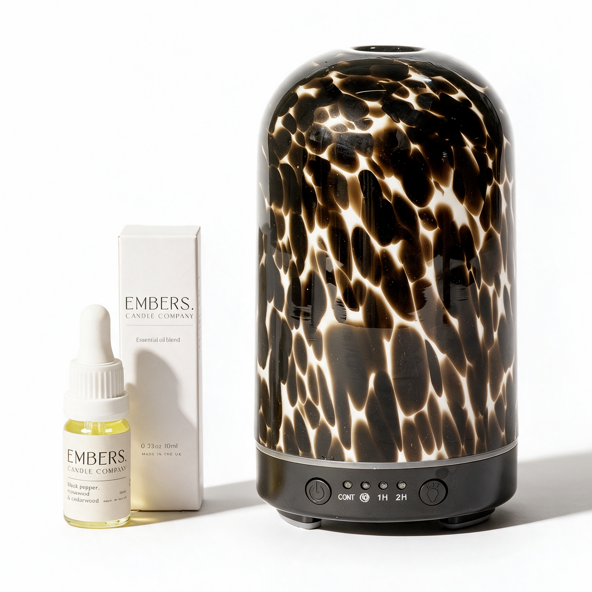 Brown torte electric wellness diffuser & essential oil blend