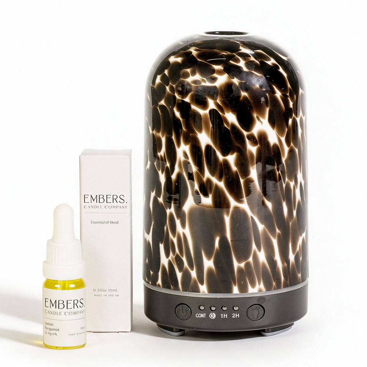 Brown torte electric wellness diffuser & essential oil blend