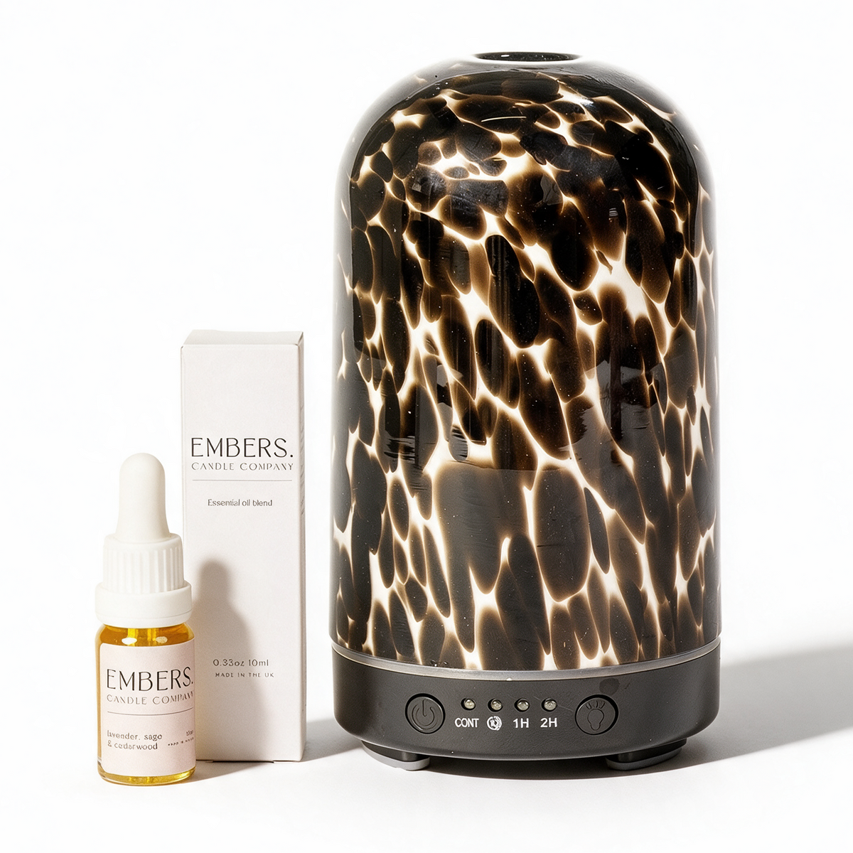 Brown torte electric wellness diffuser & essential oil blend