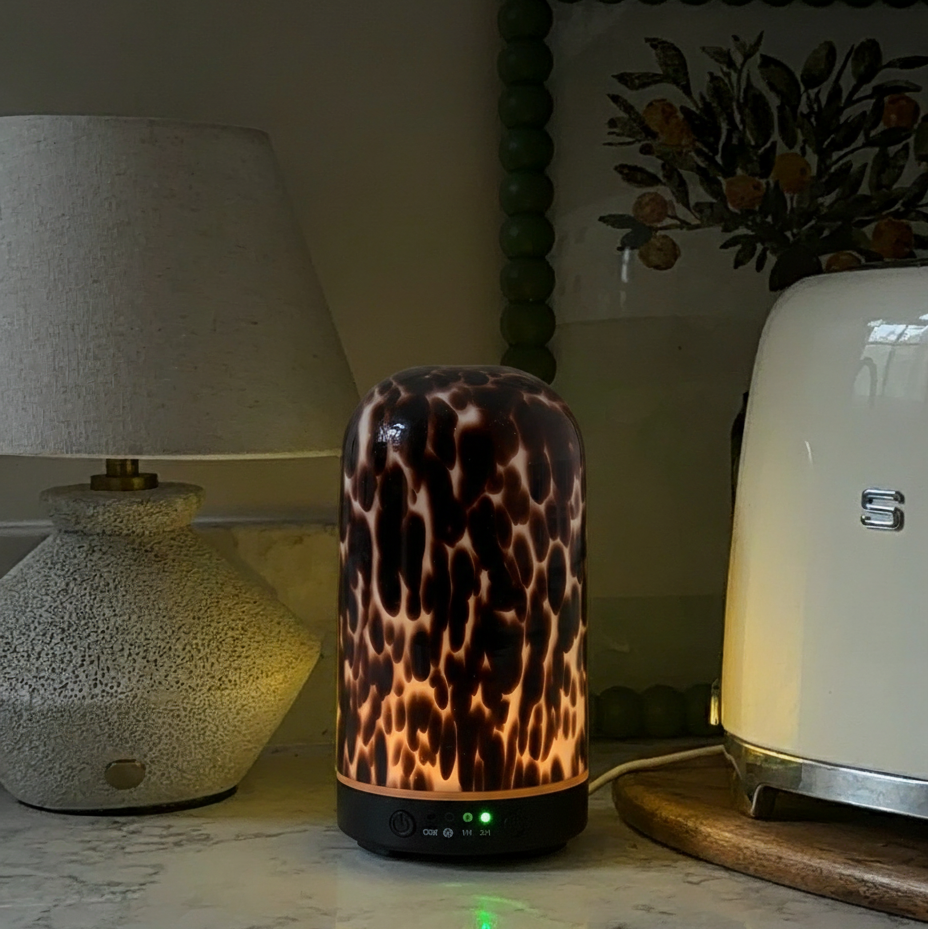 Brown torte electric wellness diffuser & essential oil blend