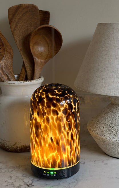 Brown torte electric wellness diffuser & essential oil blend