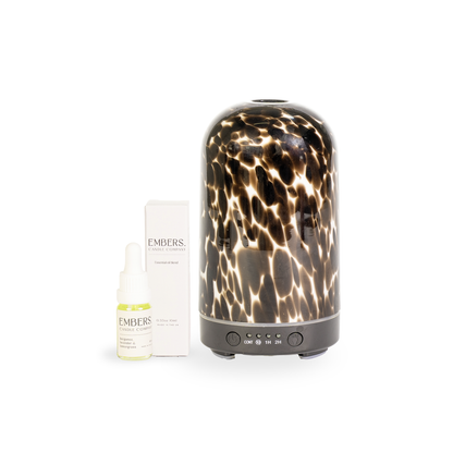 Brown torte electric wellness diffuser & essential oil blend