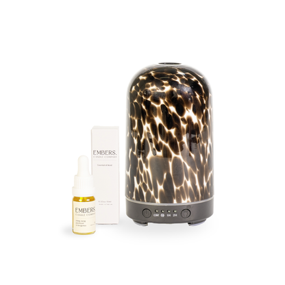 Brown torte electric wellness diffuser & essential oil blend